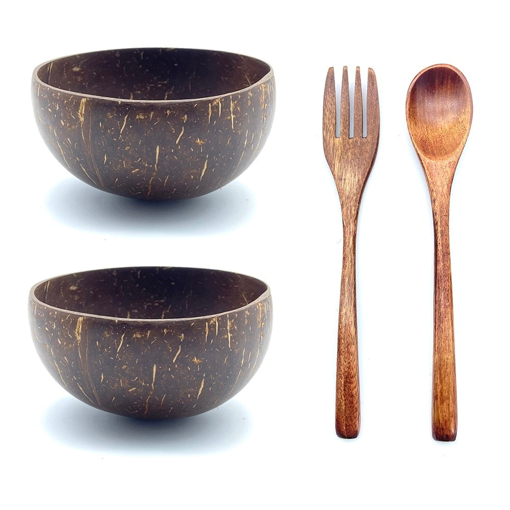 two coconut bowls with wood fork and spoon