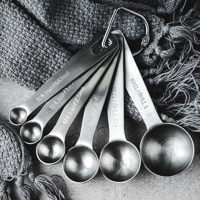 fanned out set of measuring spoons