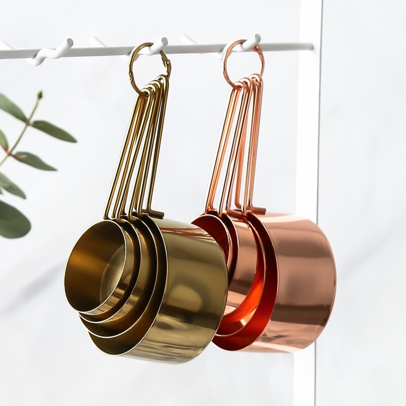 cooper and gold hanging measuring cups