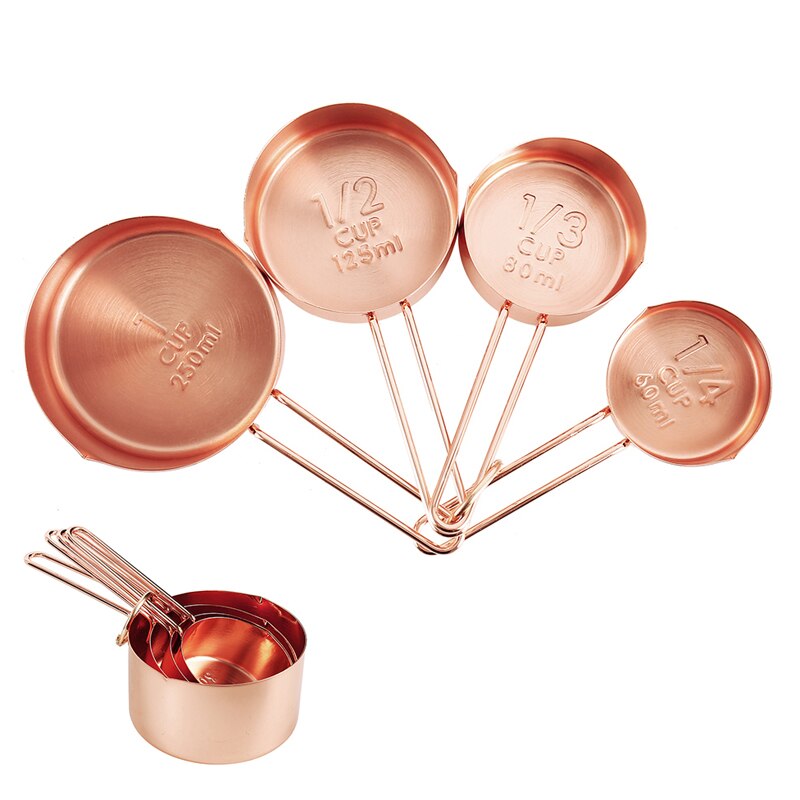 fanned out copper measuring cups